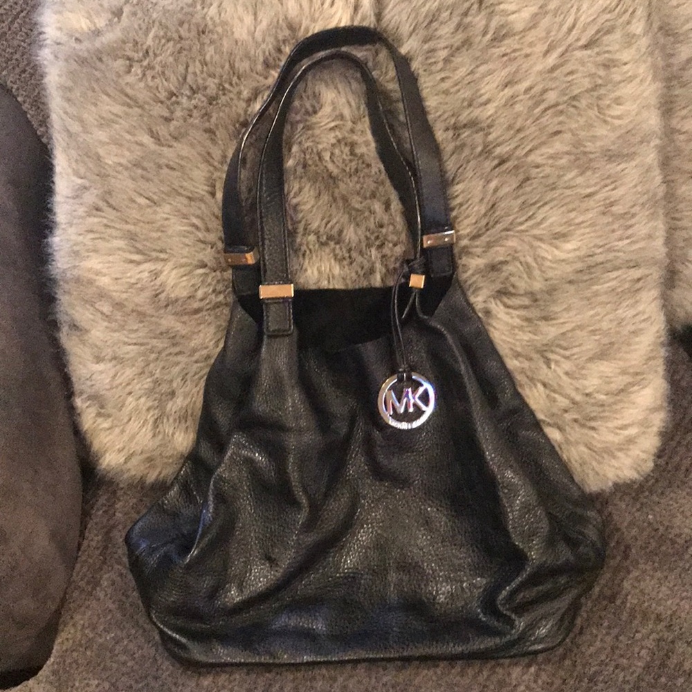 Black leather Michael Kors bag gold accents